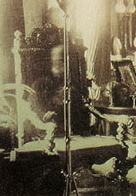 In 1891, one of the best-known ghost photos of all time was taken by Sybell Corbett at Combermere Abbey in Cheshire, England. The photo was of a library room, taken with an exposure of one hour. Although the room was apparently unoccupied the entire time, the resulting photo clearly showed a man sitting in a chair. The man was identified by a relative as Lord Combermere, who had died in an accident five days earlier.